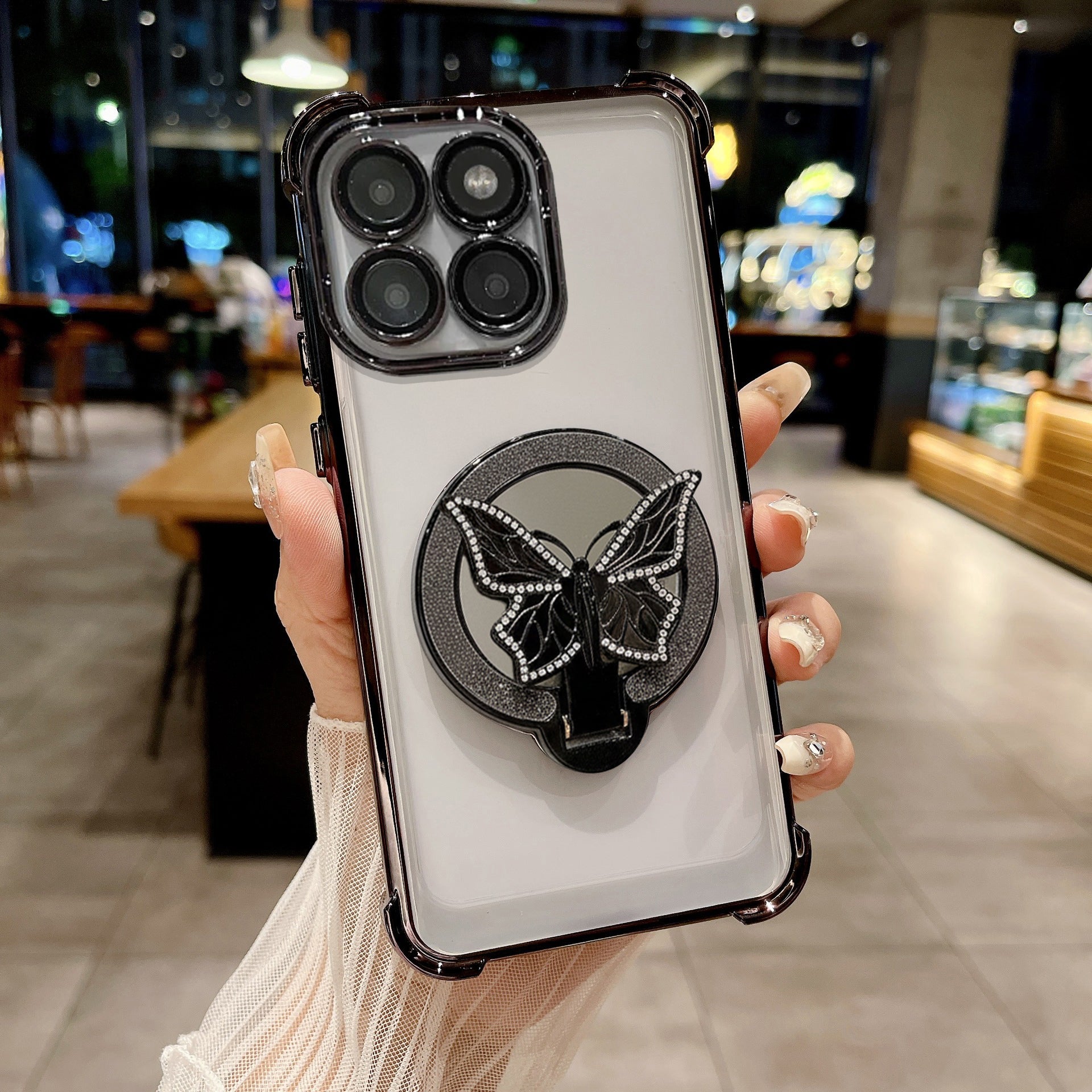 Motorola Edge 60 Pro 5G Phone case with butterfly design held by a person in an indoor setting